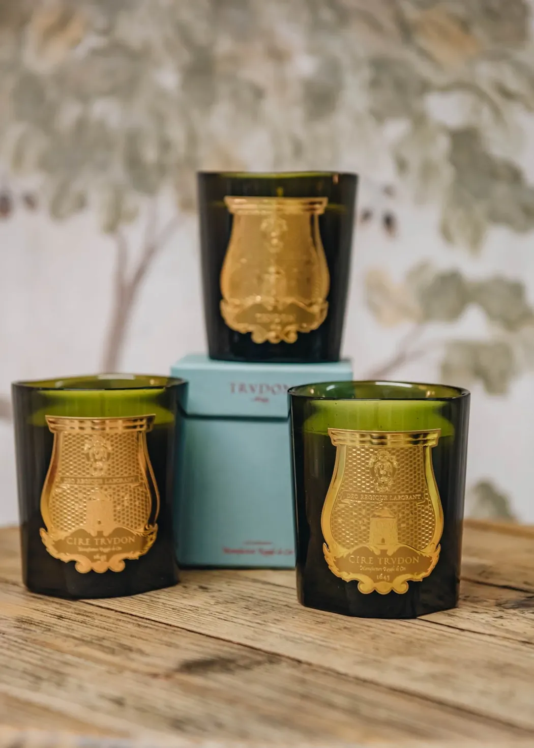 Cire Trudon luxury candles creating spa ambiance for mobile massage therapy